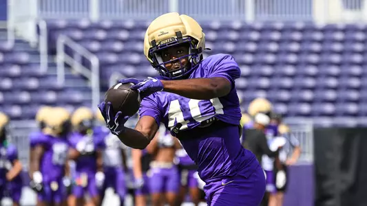 Zion Hudson makes a catch during a JMU football practice