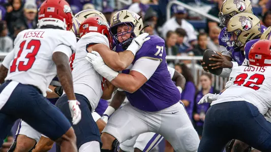 Evan Bushong blocks a defender against Liberty