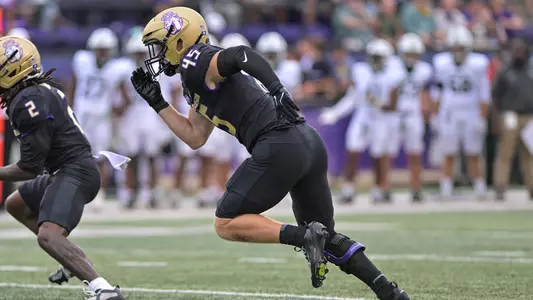 Lee Johnson chases the ball carrier during JMU's game against Wagner