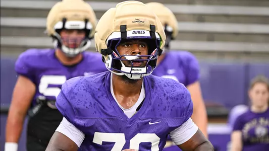 Noel Portnjagin participates in a dril during a JMU football praftice