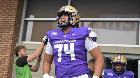 Sani Reed exits the locker room prior to JMU's game against Liberty