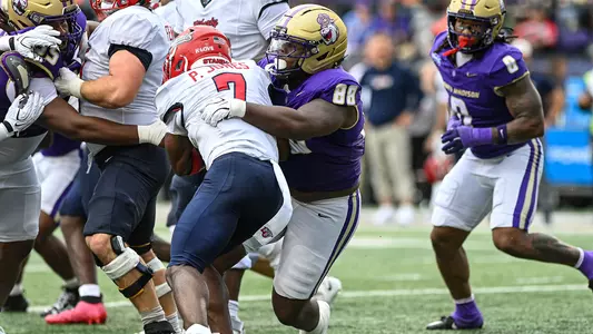 Kells Bush tackles a Liberty ballcarrier