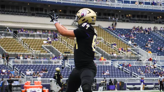 Thomas Guillemette makes a catch during warmups against Wagner