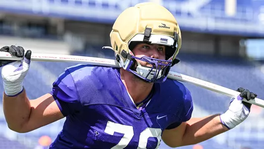 Joshua Manecke participates in a drill during a JMU football practice