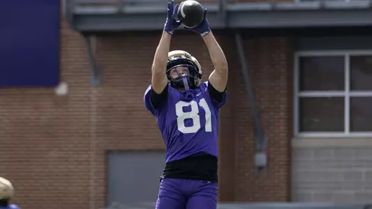Chase Pensyl makes a catch during a JMU football practice