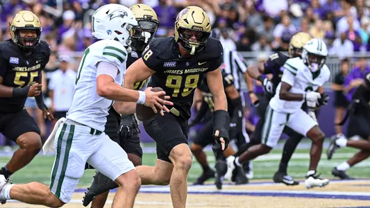 Turner Schmidt in pursuit of the quarterback against Wagner
