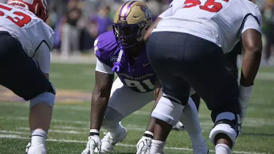 Jakolbi Wilson lines up during JMU's game against Liberty