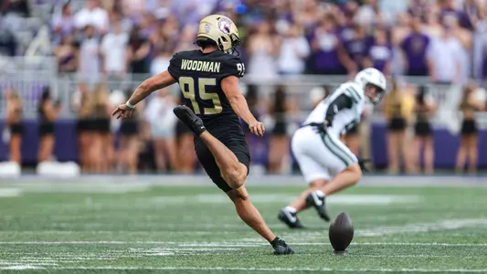 Baylen Woodman kicks off against Wagner