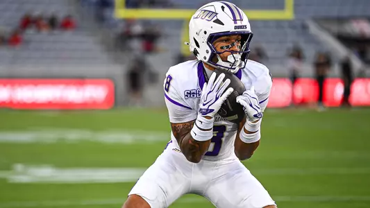 Jeremiah Harrison makes a catch pregame at San Diego State