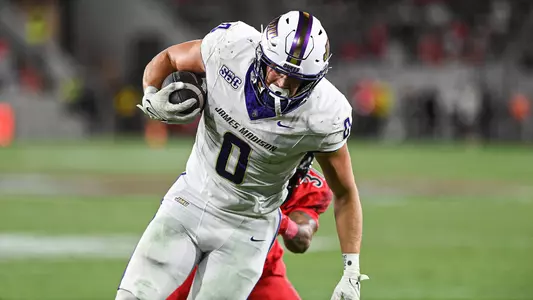 Cole Keller breaks a tackle after making a reception at San Diego State