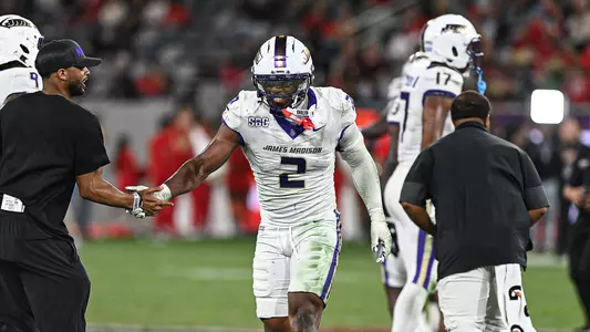Nakian Jackson celebrates after making a tackle at San Diego State