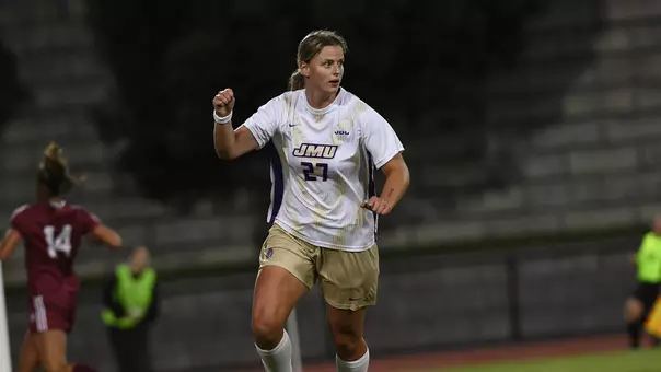 Ginny Lackey celebrates after scoring a goal against ULM at Sentara Park