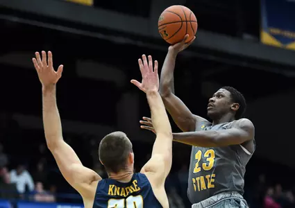Kent State's Jaylin Walker puts up a shot against Toledo's Luke Knapke in the second half of Tuesday's game at the MAC Center. (NICK CAMMETT/KENT STATE UNIVERSITY)