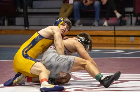 Nico Calello wins by MD 14-4