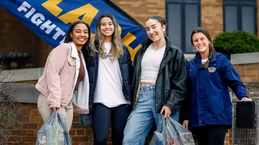 Paije Lewis (UA Director of Student-Athlete Development), Karina Salinas (KSU Volleyball), Emanouela Christodoulou (UA Volleyball) and Camryn Meek (KSU Lacrosse)