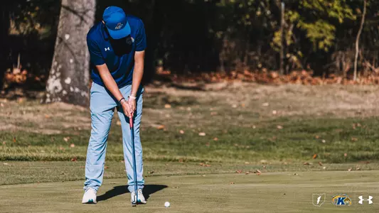 Christoffer Leuenhagen following through on a putt on the green