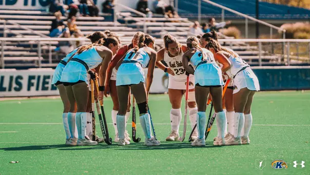 The 2026 Field hockey team huddling up during the regular season home finale