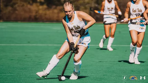 MK Finnan driving the ball down the pitch against Ohio