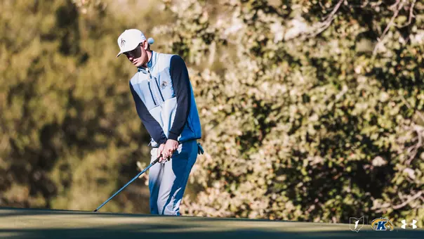 Nolan Haynes chipping a shot onto the green