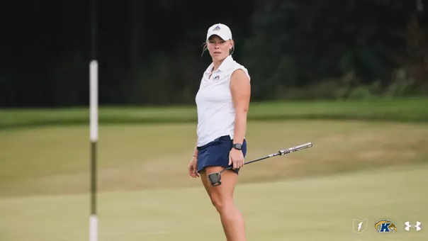 Aryn Matthews looking on as she puts onto the green