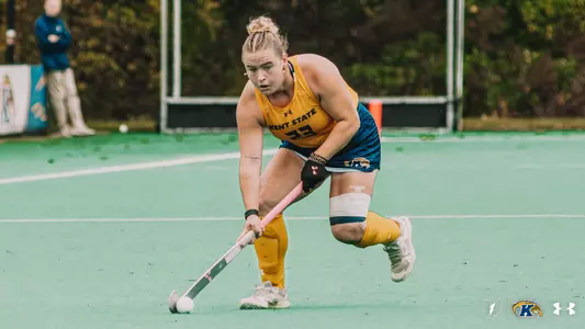 Emily Robertson shooting a snapshot towards the net