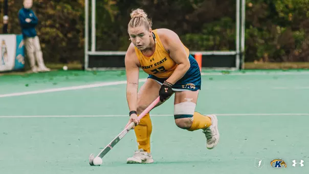 Emily Robertson shooting a snapshot towards the net