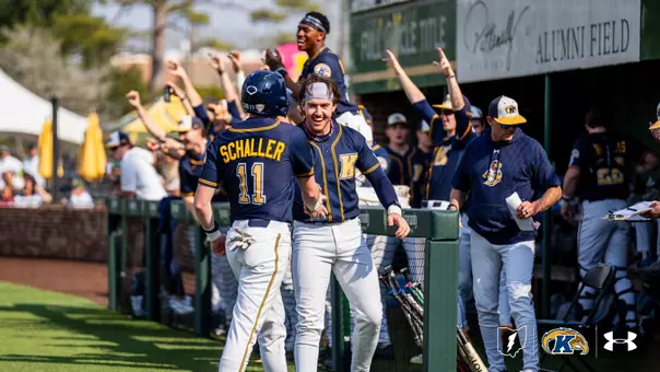 Kent State baseball celebrating by the dugout