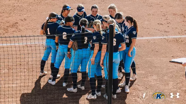 Softball huddle at UNCG 2026