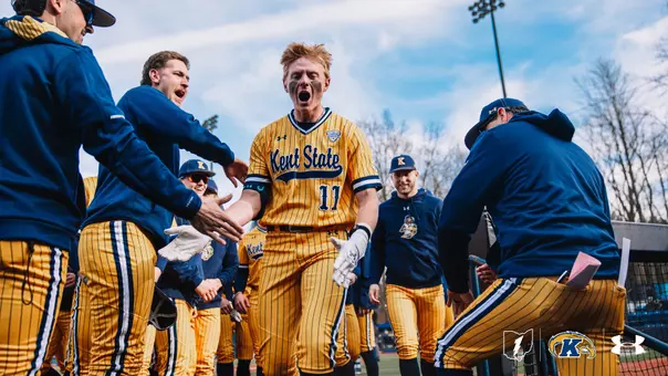 Kolton Schaller celebrating in dugout