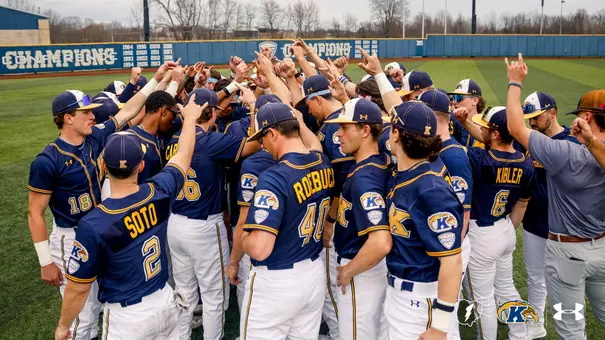 Baseball team photo huddled up