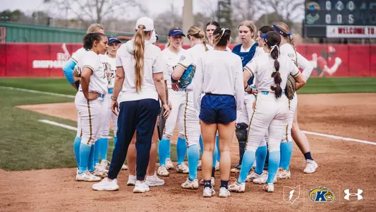 Softball team huddle at 2026 Crimson Classic