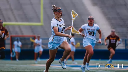 Morgan Halli runs up the field with the ball against Central Michigan