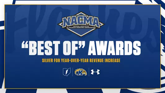 Award announcement graphic on a navy blue background featuring the NACMA (National Association of Collegiate Marketing Administrators) logo at the top, with '"Best Of" Awards' in large bold white text and 'Silver for Year-Over-Year Revenue Increase' in gold text below, and the Kent State lightning bolt, Golden Flashes, and Under Armour logos centered at the bottom.
