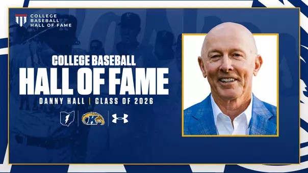 nduction announcement graphic on a navy background featuring the College Baseball Hall of Fame logo at the top left, 'College Baseball Hall of Fame – Danny Hall – Class of 2026' in bold white and gold text, a smiling headshot of Danny Hall in a blue plaid blazer and white shirt at right in a gold-bordered frame, and the Kent State lightning bolt, Golden Flashes, and Under Armour logos below the text.