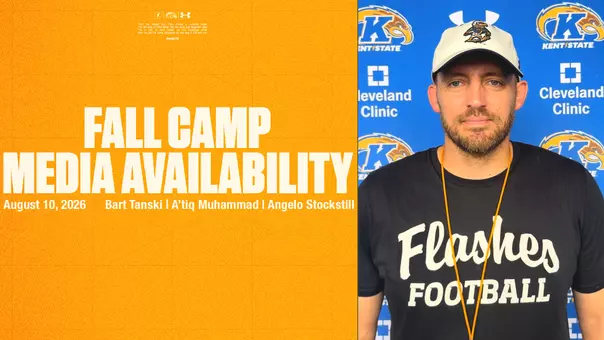 A split-screen graphic for Kent State Football. The left side features a yellow background with the text "FALL CAMP MEDIA AVAILABILITY," "August 10, 2026," and three names: Bart Tanski, A'tiq Muhammad, and Angelo Stockstill. The right side is a photo of a man wearing a black "Flashes Football" t-shirt and white cap, standing in front of a blue backdrop with Kent State, Cleveland Clinic, and Under Armour logos.