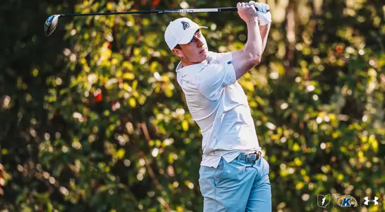 Darcy Hogg chipping with an iron