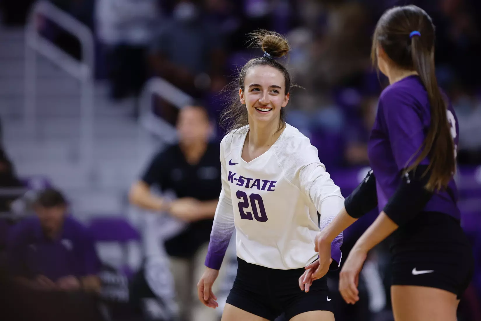 Mackenzie Morris competes during K-State's match against Kansas on Nov. 27th