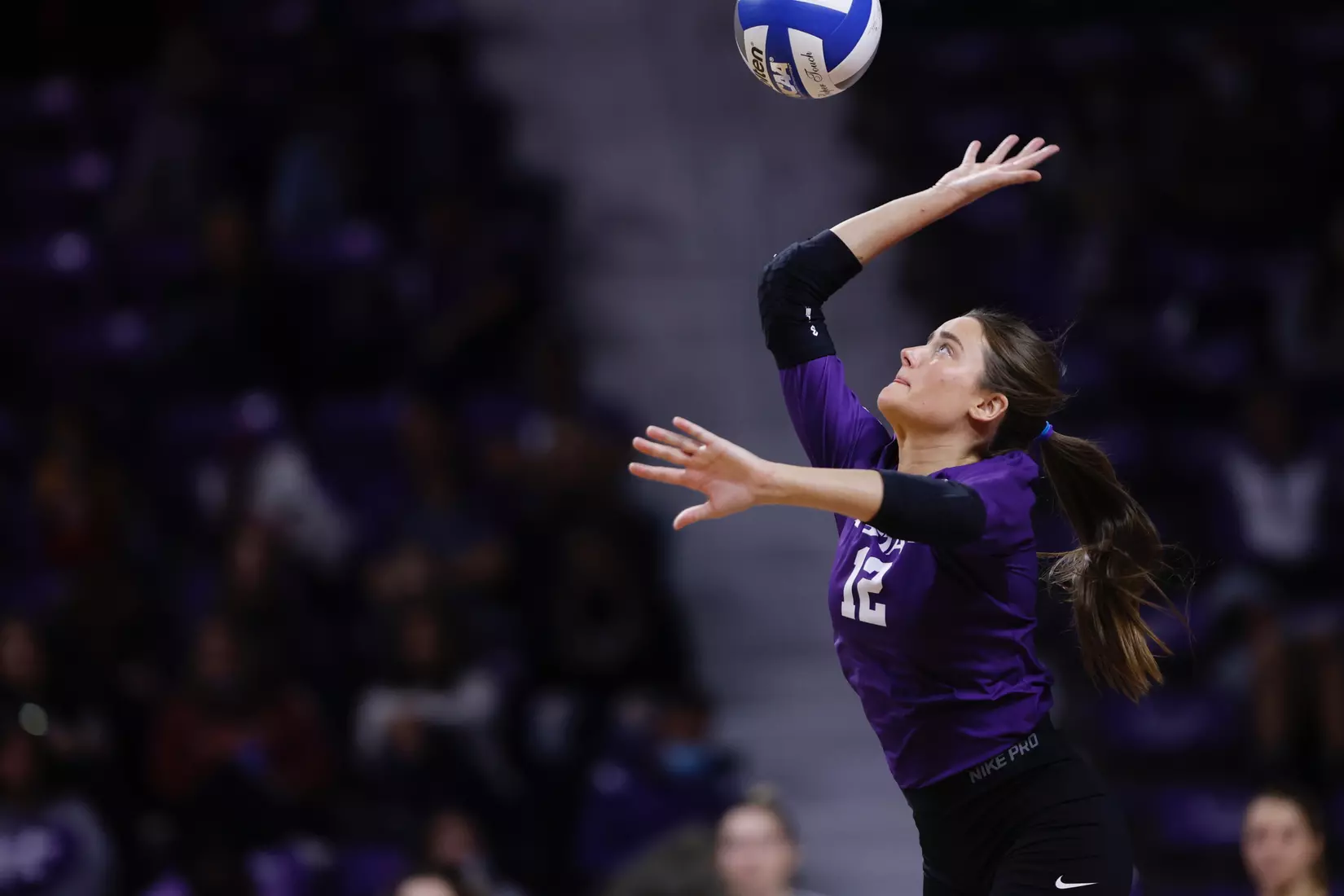 Loren Hinkle serves during K-State's Senior Night match against Kansas on Nov. 27th