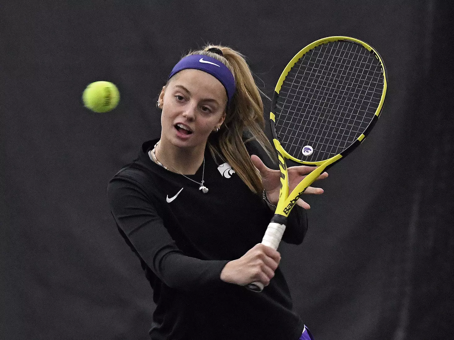 K-State’s Florentine Dekkers competes against Memphis at the Body First Indoor Tennis Center in Manhattan, Kansas on February 11, 2022.
