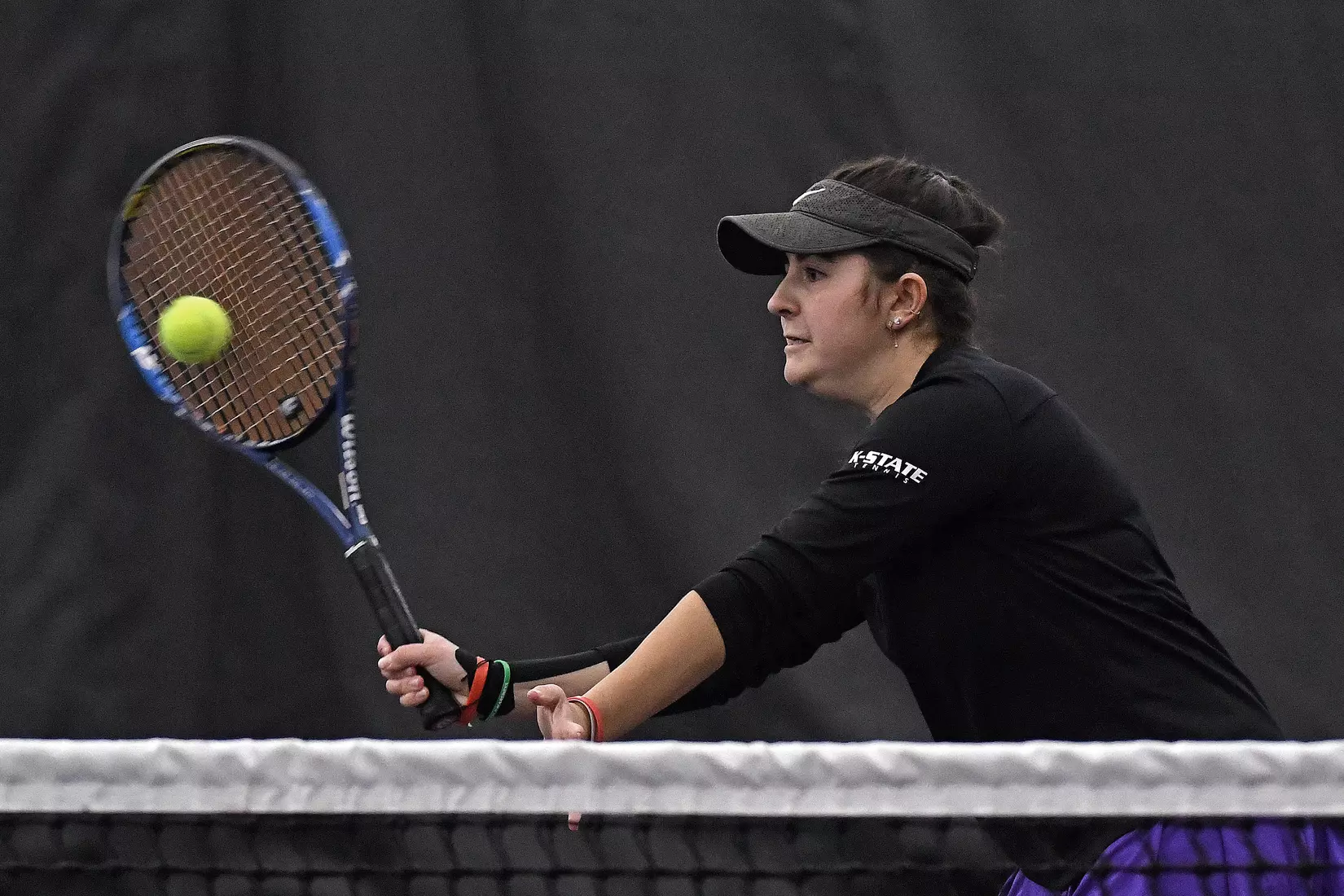 K-State’s Anna Turco competes against Memphis at the Body First Indoor Tennis Center in Manhattan, Kansas on February 11, 2022.