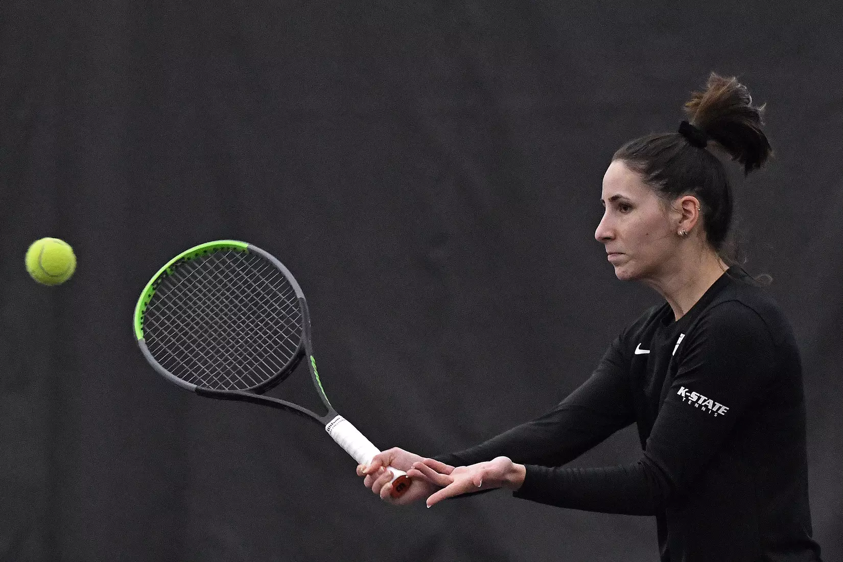 K-State’s Ioana Gheorghita competes against Memphis at the Body First Indoor Tennis Center in Manhattan, Kansas on February 11, 2022.
