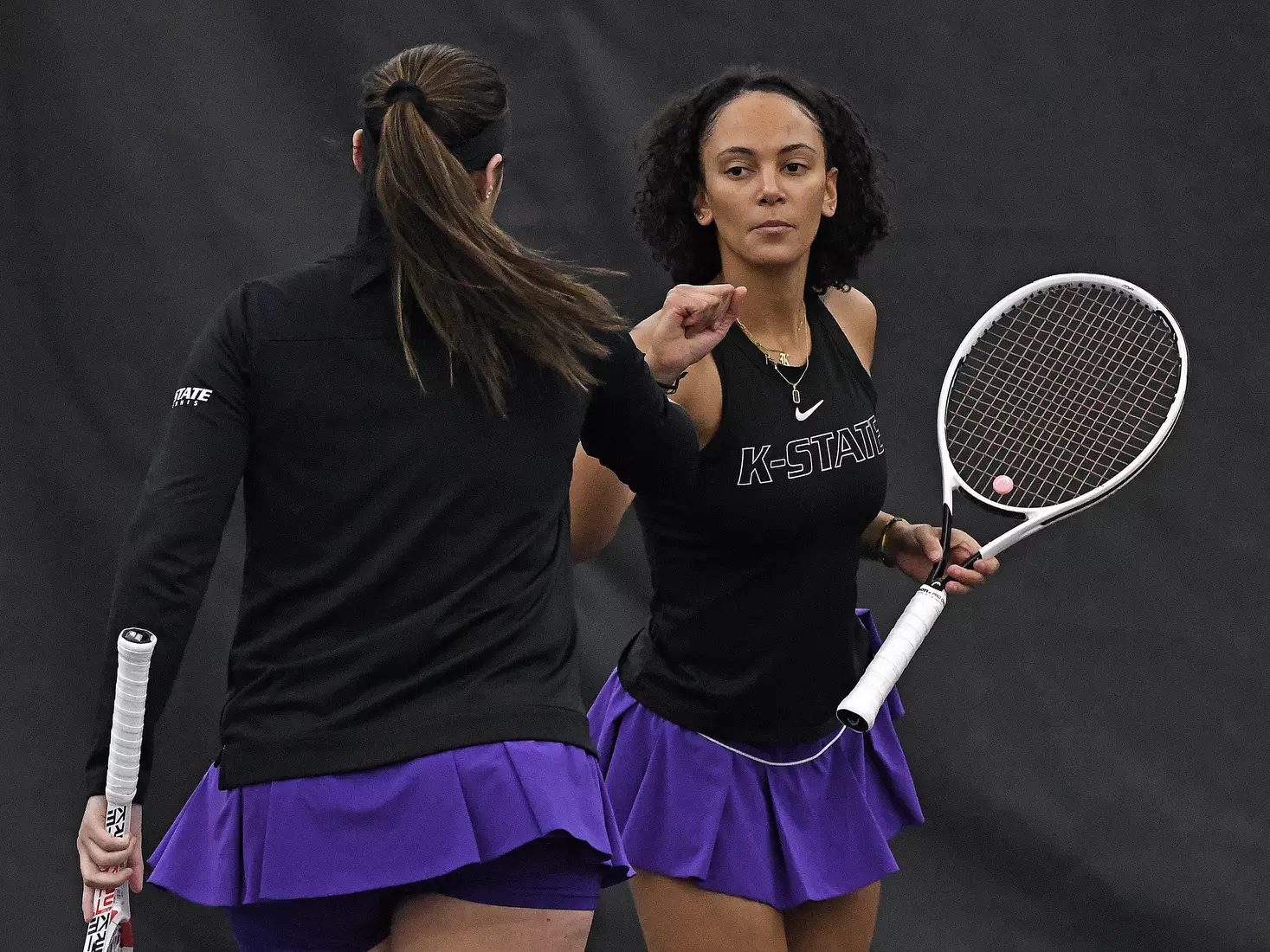 K-State’s Maria Linares and Karine-Marion Job compete against Memphis at the Body First Indoor Tennis Center in Manhattan, Kansas on February 11, 2022.