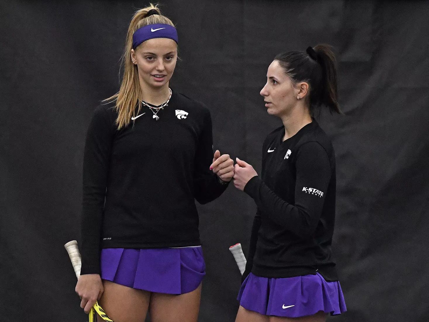 K-State’s Florentine Dekkers and Ioana Gheorghita compete against Memphis at the Body First Indoor Tennis Center in Manhattan, Kansas on February 11, 2022.