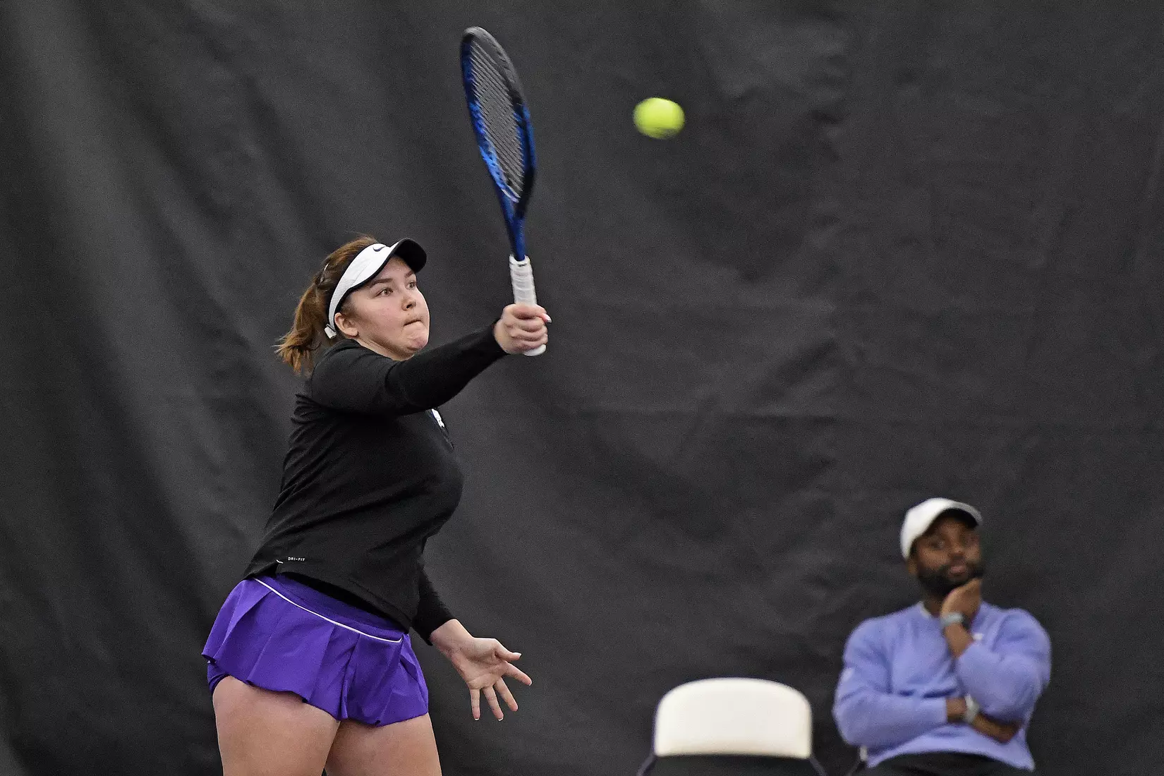 K-State’s Dinara Alloyarova competes against Memphis at the Body First Indoor Tennis Center in Manhattan, Kansas on February 11, 2022.