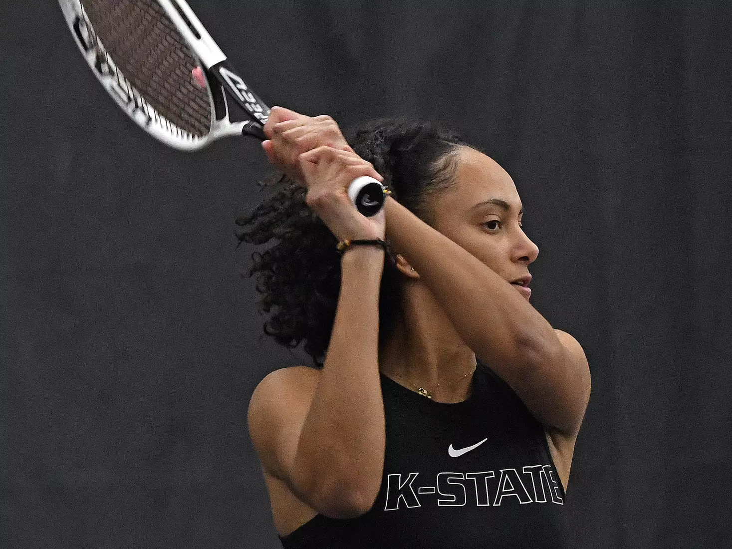 K-State’s Karine-Marion Job competes against Memphis at the Body First Indoor Tennis Center in Manhattan, Kansas on February 11, 2022.