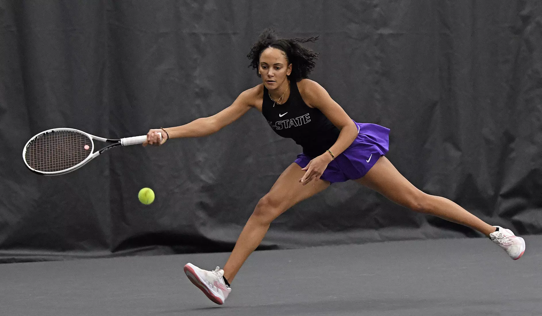 K-State’s Karine-Marion Job competes against Memphis at the Body First Indoor Tennis Center in Manhattan, Kansas on February 11, 2022.