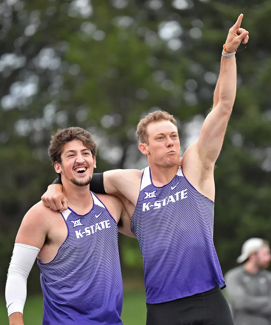 Logan Wolfley of Kansas State reacts after winning the Men's Javelin, with teammate Luke Ralston during the Big 12 Outdoor Track & Field Championship at R.V. Christian Track & Field Complex on May 14, 2021 in Manhattan, Kansas.