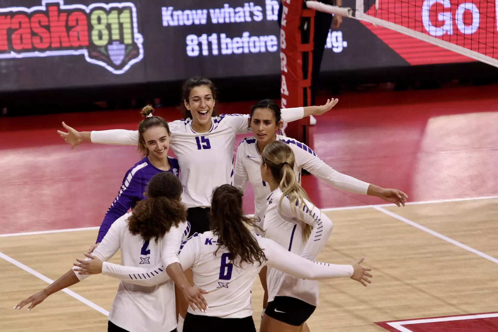 K-State celebrates against Colgate at the Husker Invitational on Friday.