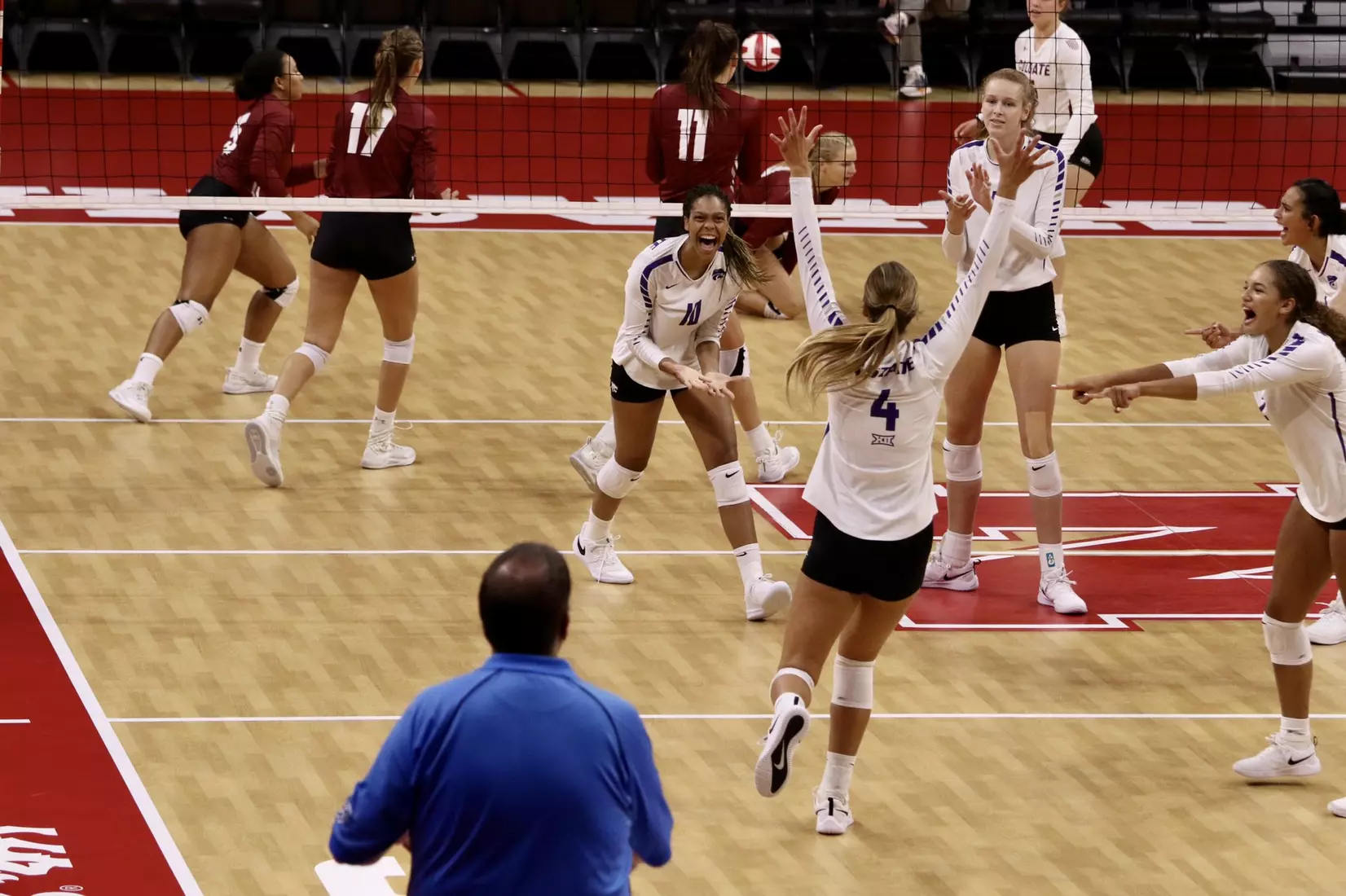 K-State celebrates against Colgate at the Husker Invitational on Friday.