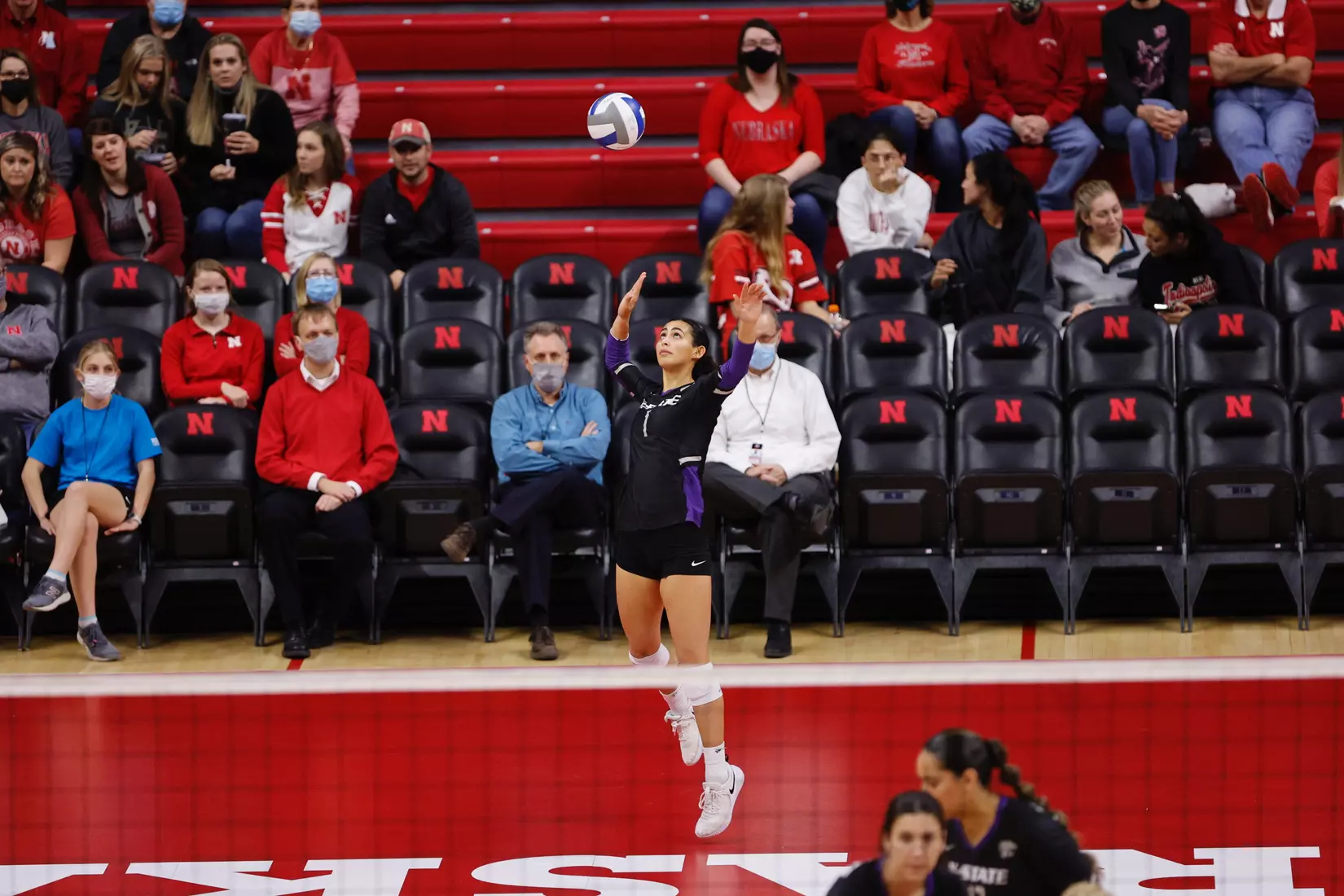 Teana Adams-Kaonohi serves against Florida State